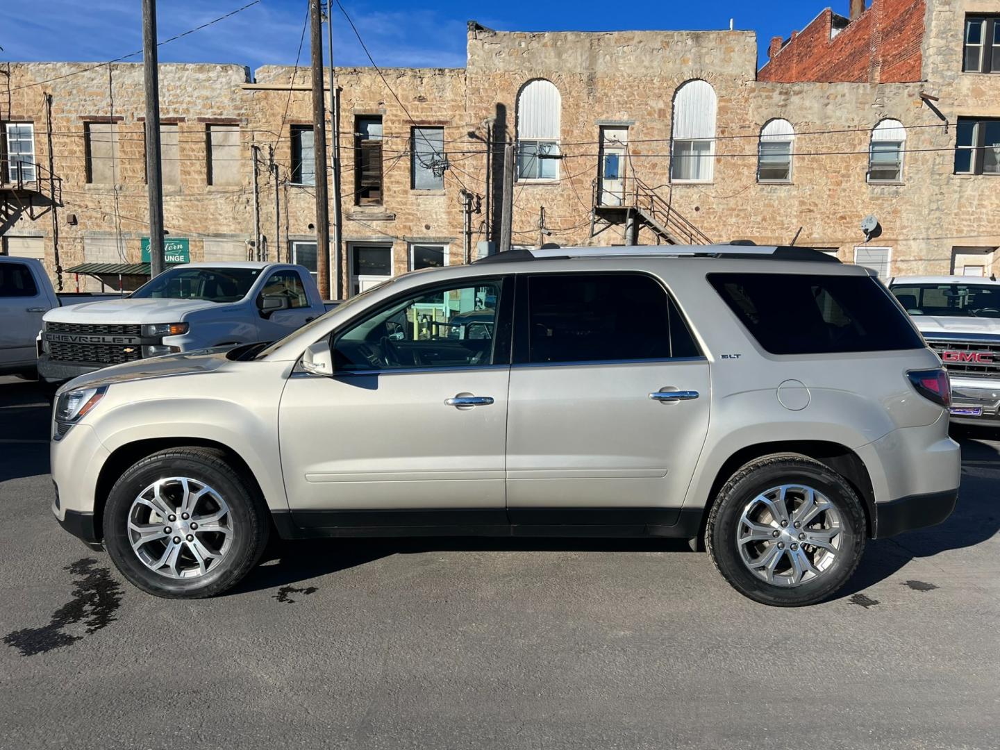 2016 Beige /Charcoal GMC Acadia SLT (1GKKVRKD2GJ) with an 3.6L V6 engine, automatic transmission, located at 116 5th Avenue South, Lewistown, MT, 59457, 47.063877, -109.427879 - Clean local trade with lots of options! Heated leather, sunroof, DVD! - Photo#4